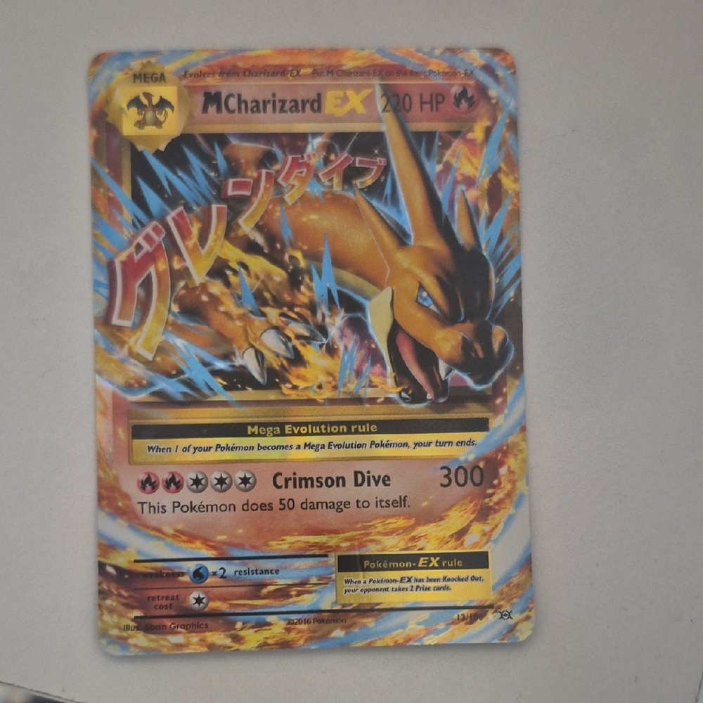Pokemon Charizard EX Trading Card - Gold and Orange